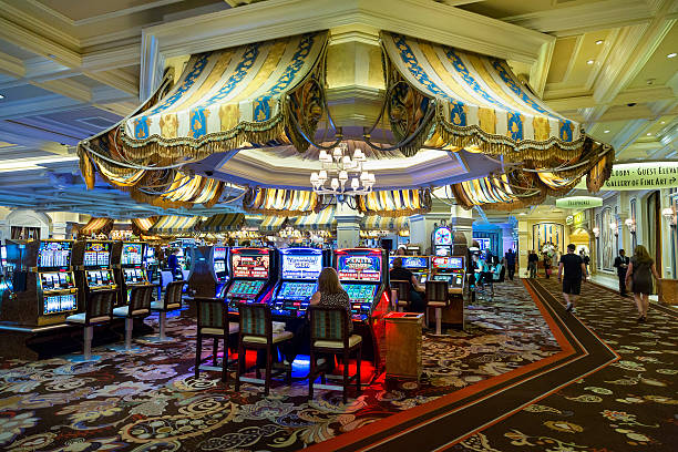 Multi-camera view of live baccarat table with dealer and betting interface